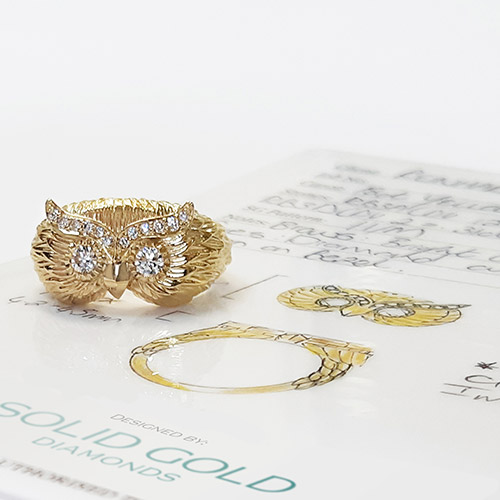 Gold owl ring with diamonds